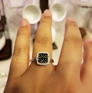 Black stone cushion cut ring